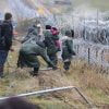migranți